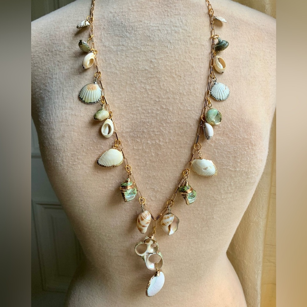 Sweet Olive Necklace of Natural Shell Charms on Gold Paperclip Chain